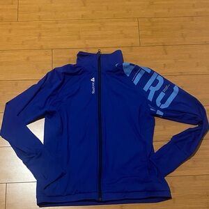 Blue Reebok zippered jacket with pockets